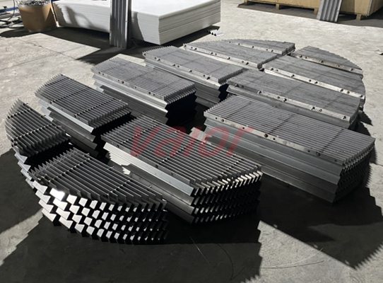 A layer of multi-bends vane pack demister is going to be pre-assembly checked.